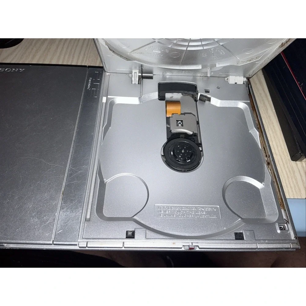 playstation 2 console,‎ 1 Wireless Controller 1 Reg Controller ,5 Games